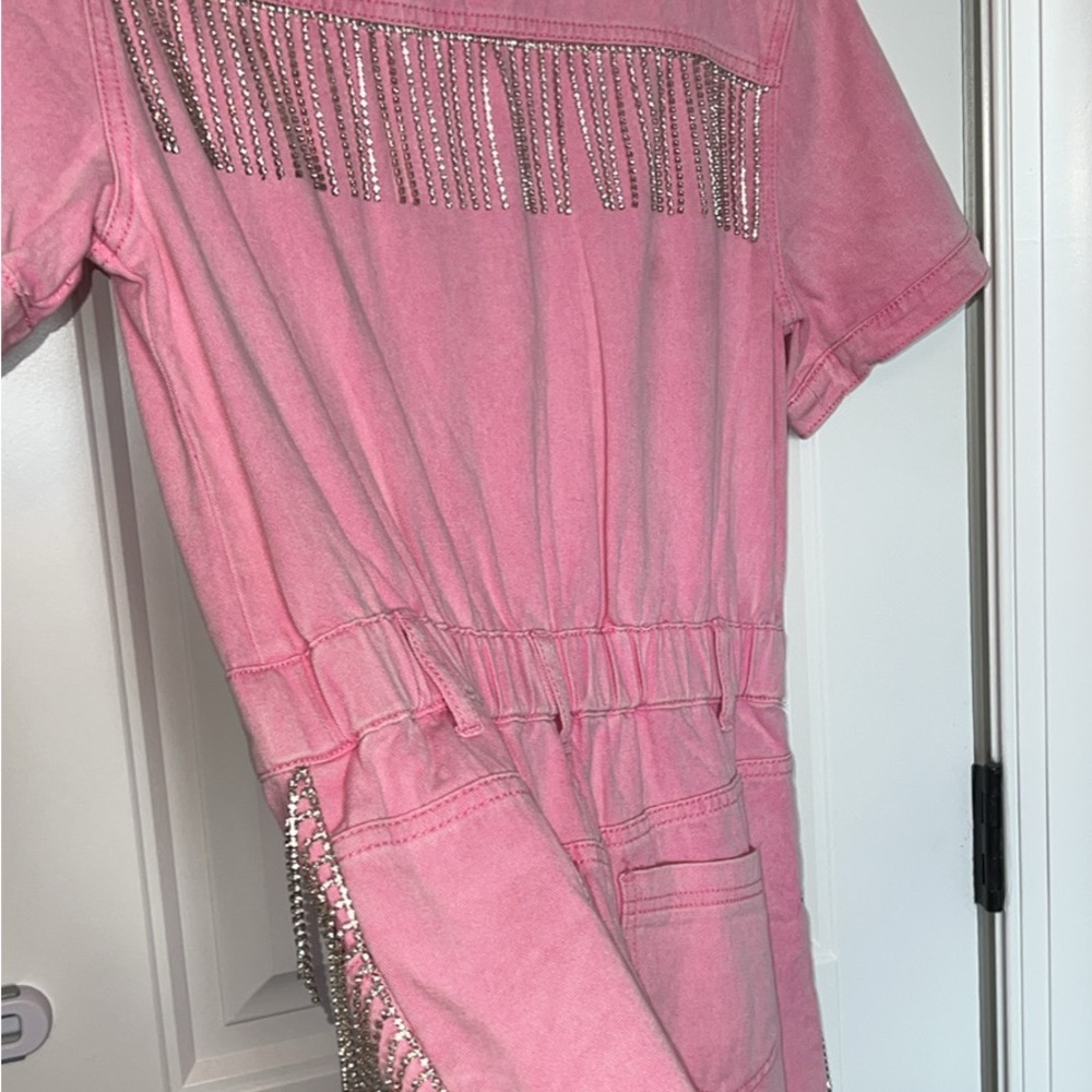 Pink denim romper with Rhinestone Fringe. NWT